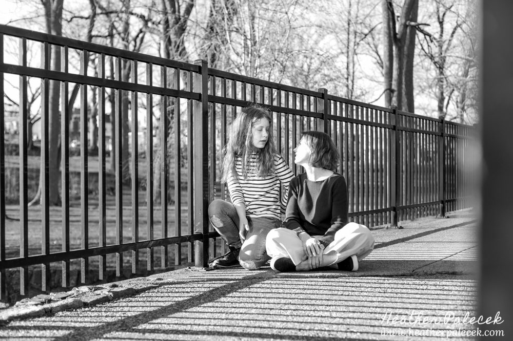 mom and daughter on bridge