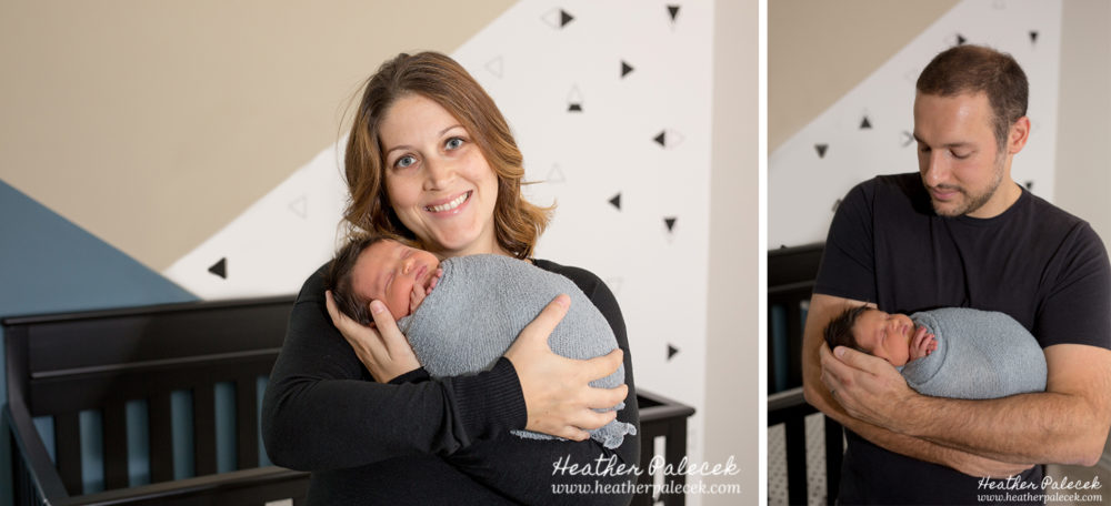 family with newborn in nursery