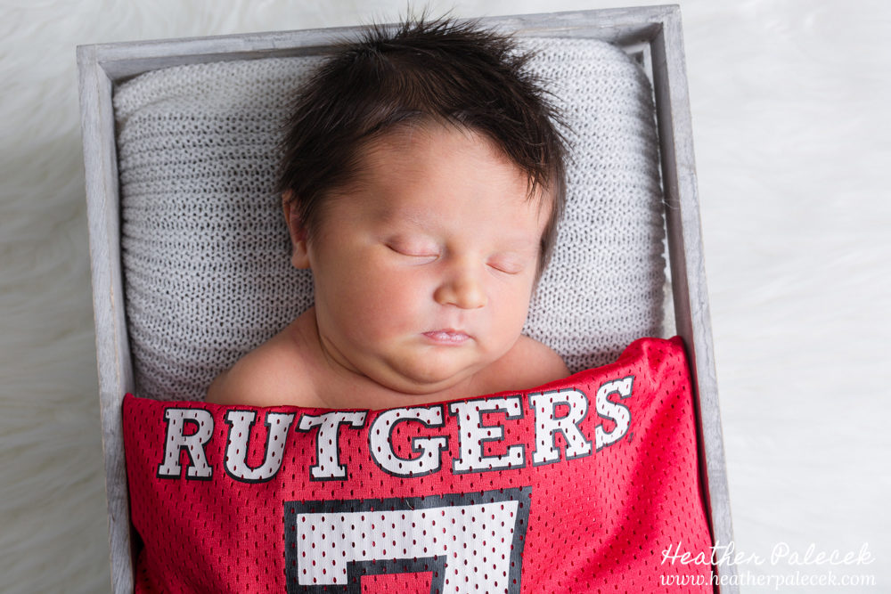 newborn photo with rutgers jersey