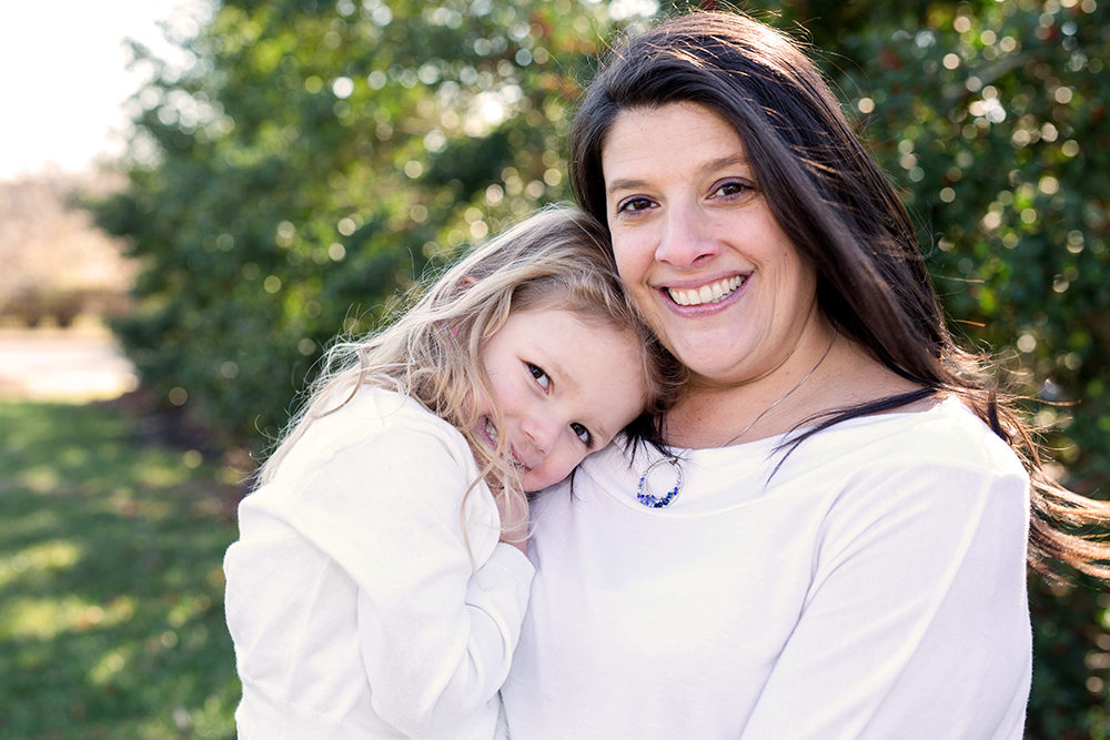 mom and daughter pose