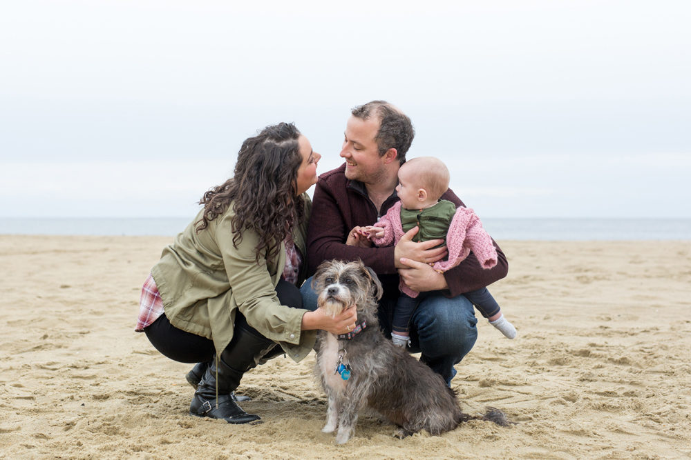 family portrait with dog on beach