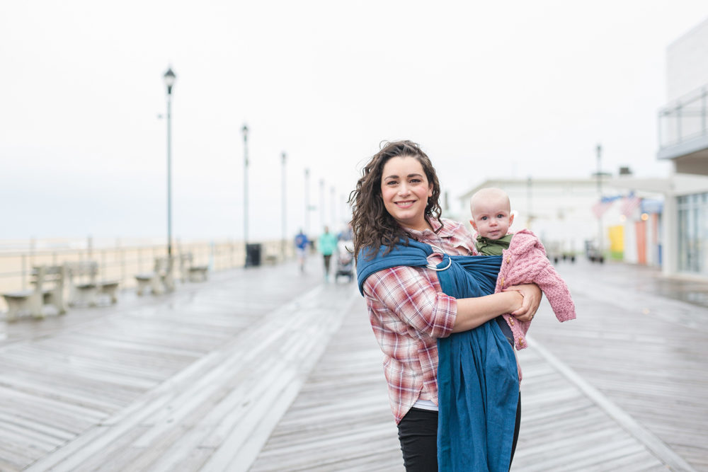mom and daughter on boardwalk
