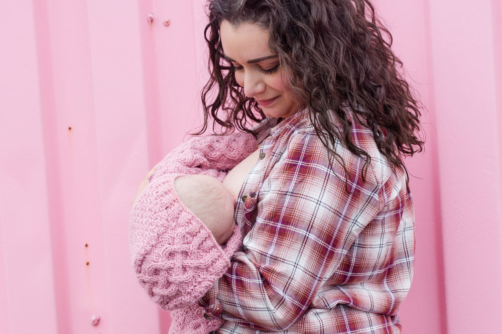 breastfeeding mom in pink