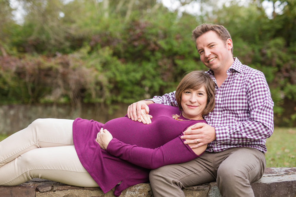maternity session couple wearing purple
