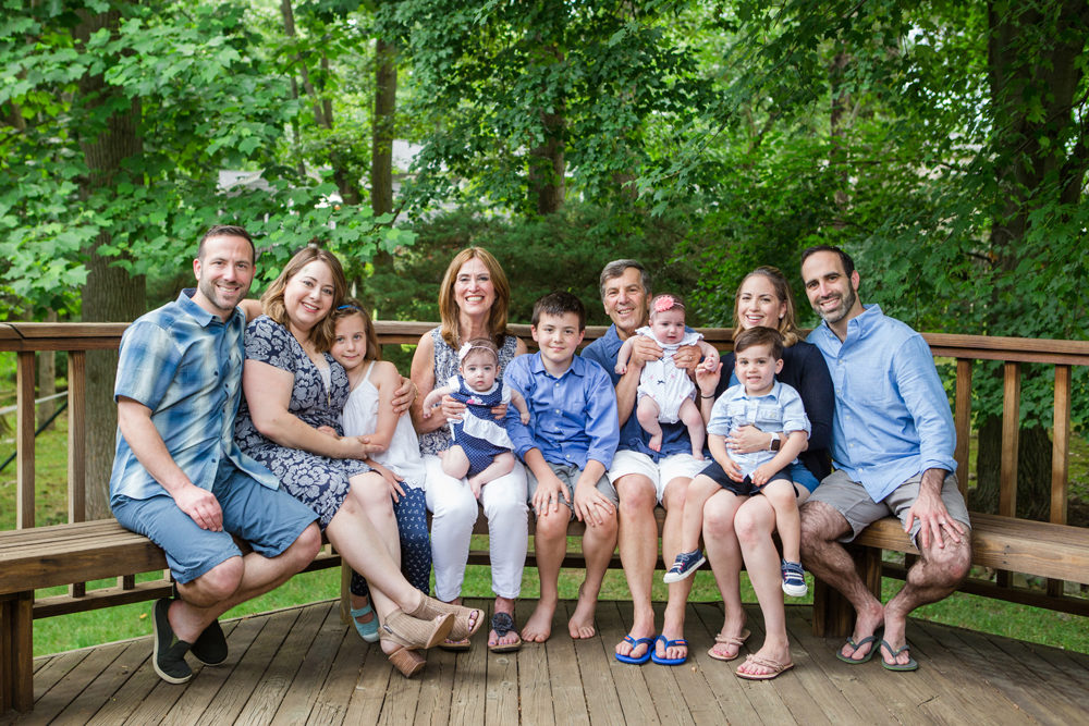 extended family portraits on back porch