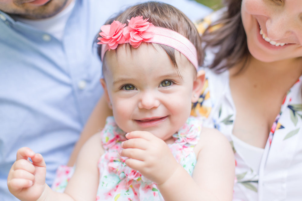 first birthday portrait in floral dress