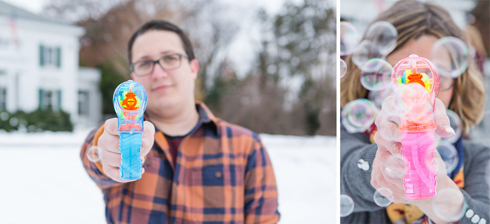 Family playing with bubble guns