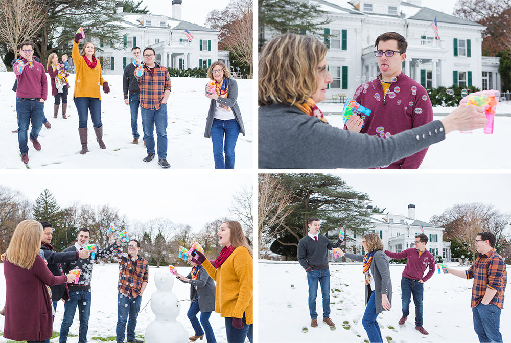 Family playing with bubble guns