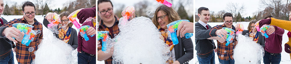 Family playing with bubble guns