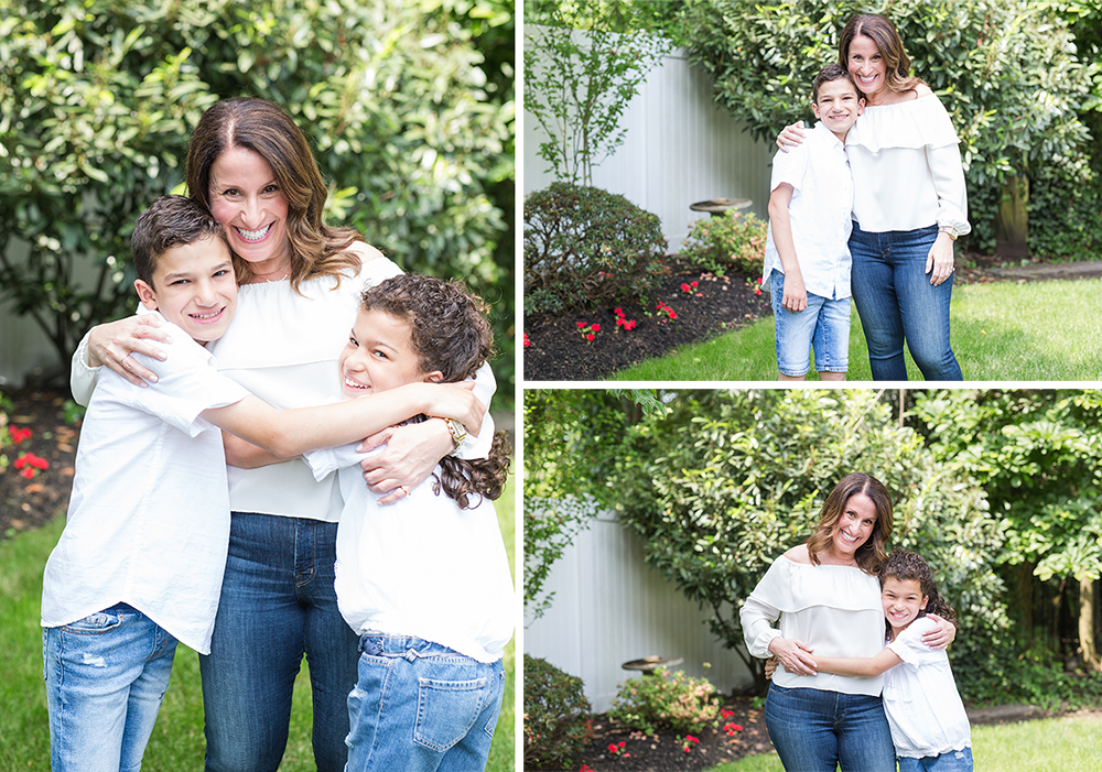 family poses in front yard for family portrait