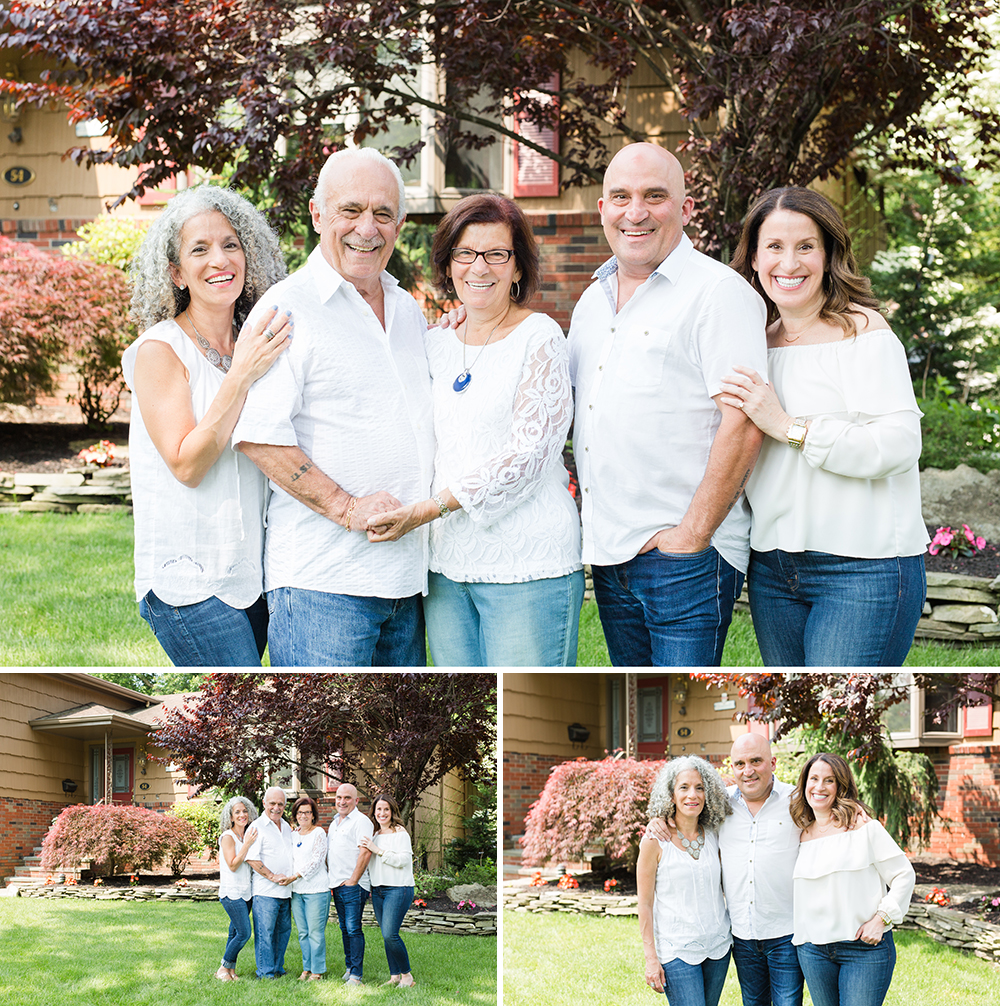 siblings pose in front of their parents house for a family portrait