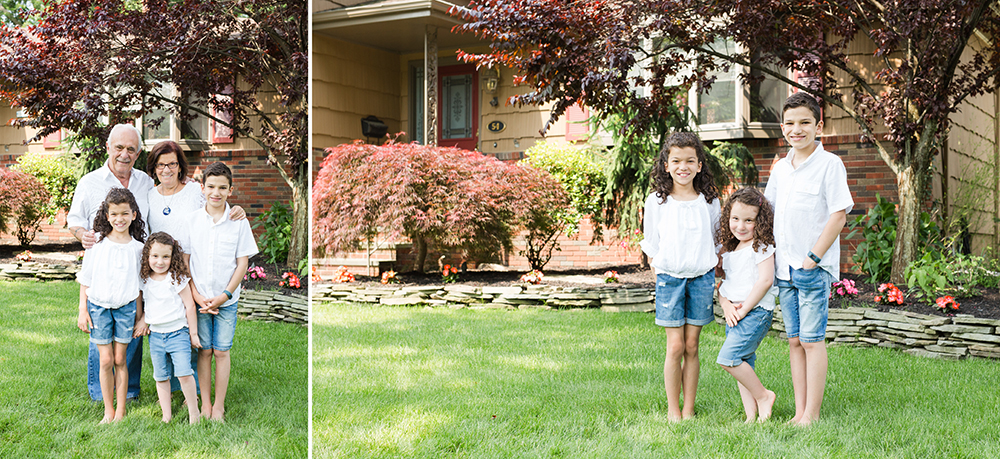 9 family members pose in front of grandparents house