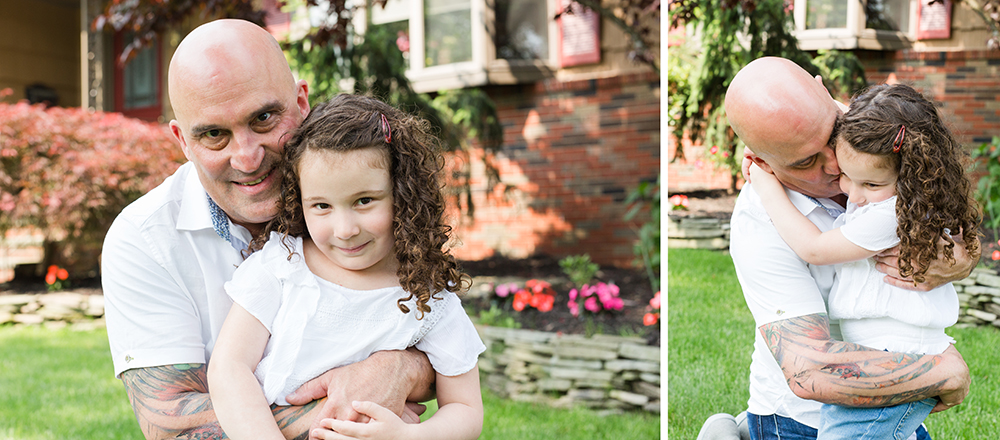 family poses in front yard for family portrait