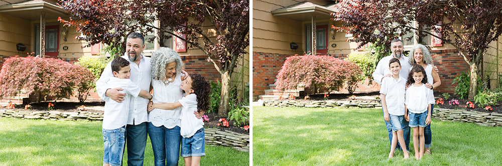 family poses in front yard for family portrait