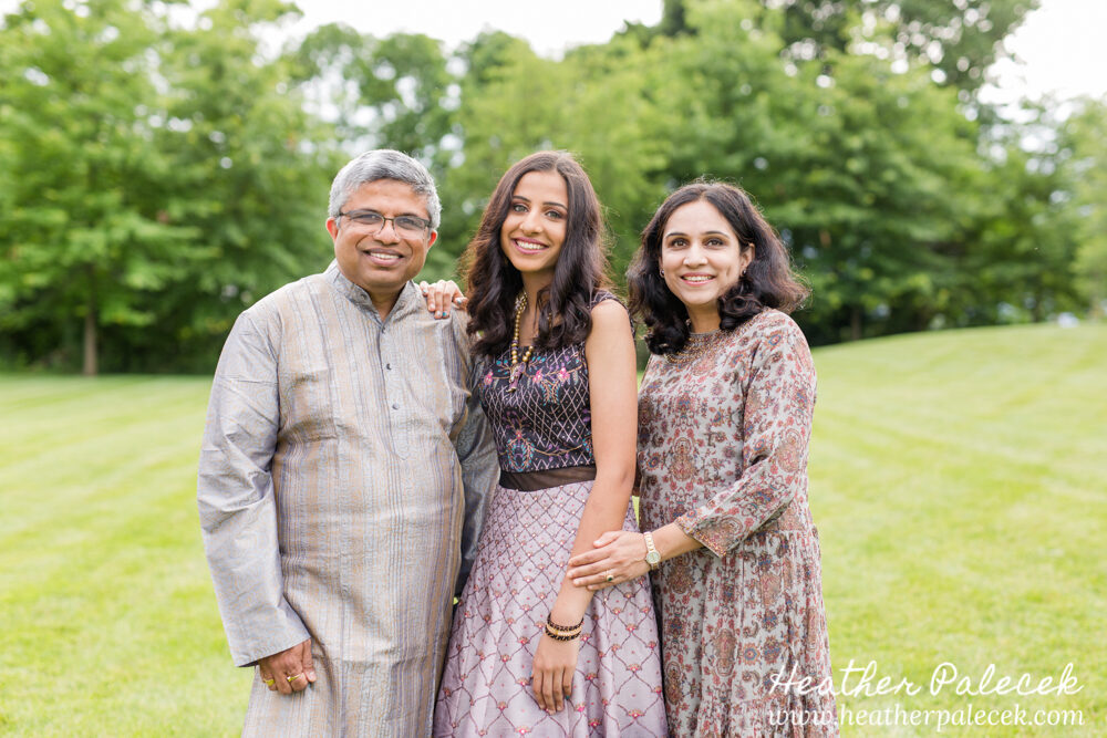girl and parents pose for sweet sixteen portrait session