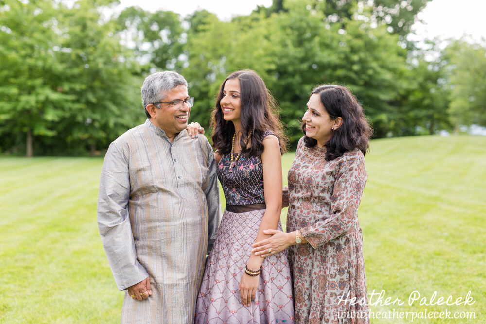 girl and parents pose for sweet sixteen portrait session