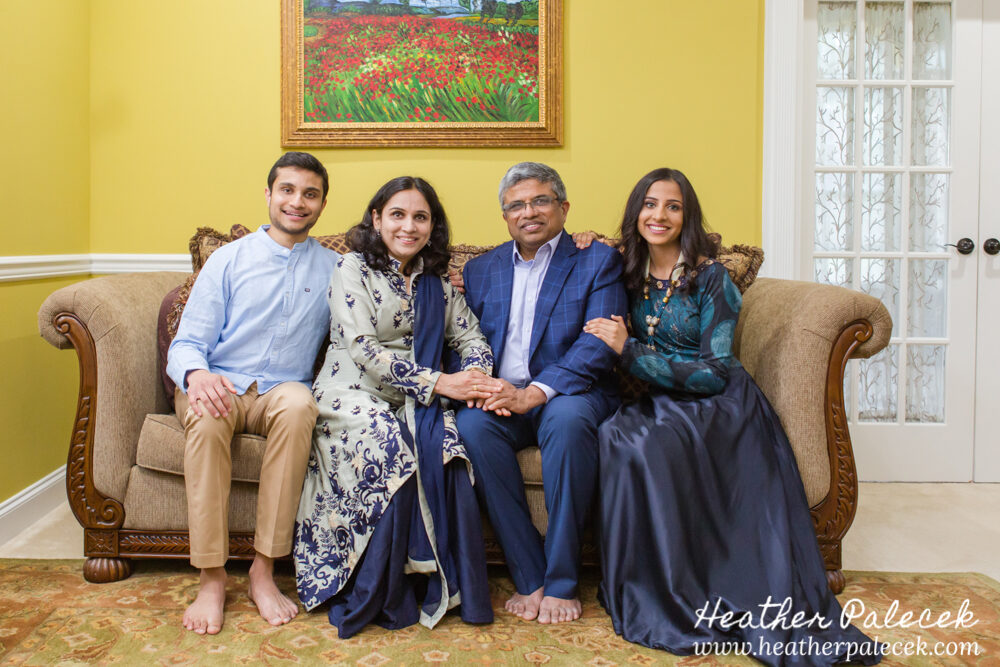 girl poses with family at sweet sixteen portrait