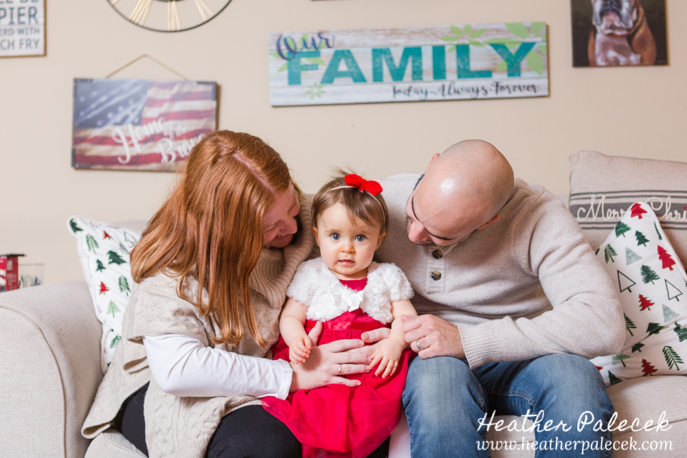 Family pose on couch in winter family session