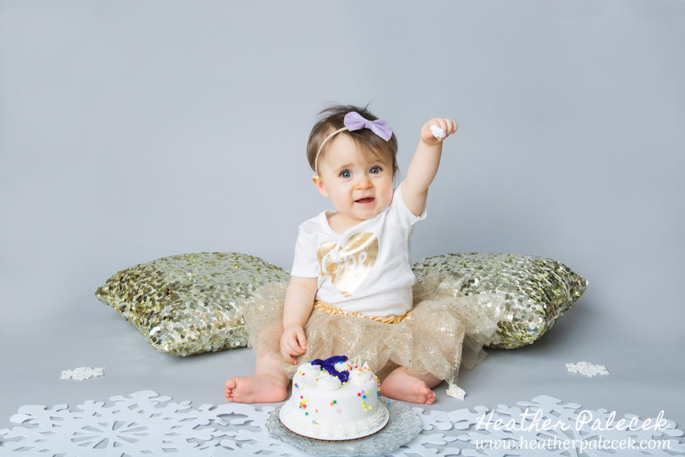 Snowflakes, Gold, and Purple 1st Birthday Cake Smash