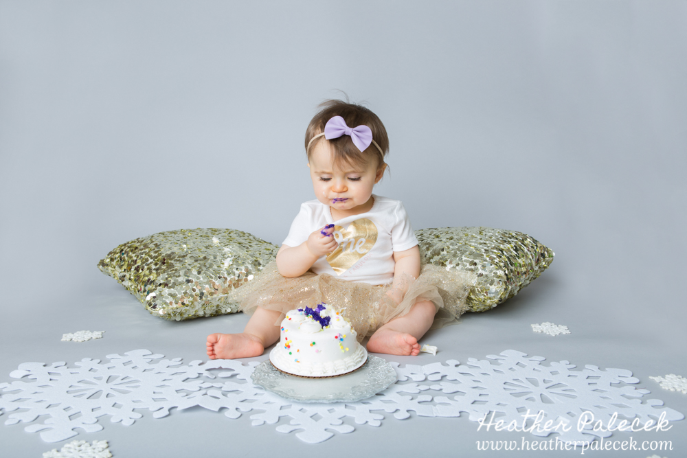 Snowflakes, Gold, and Purple 1st Birthday Cake Smash