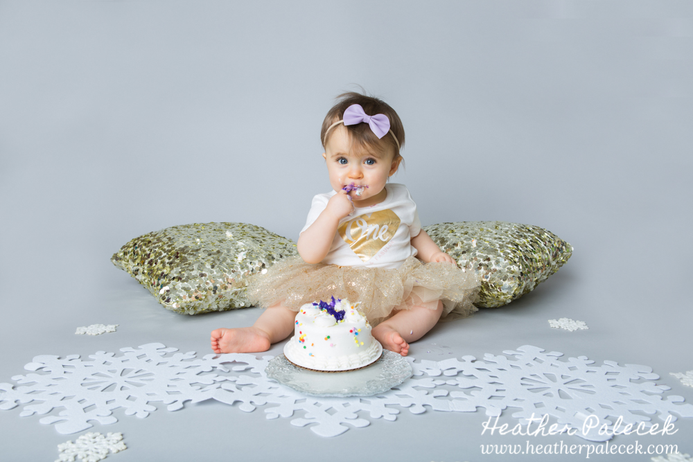 Snowflakes, Gold, and Purple 1st Birthday Cake Smash