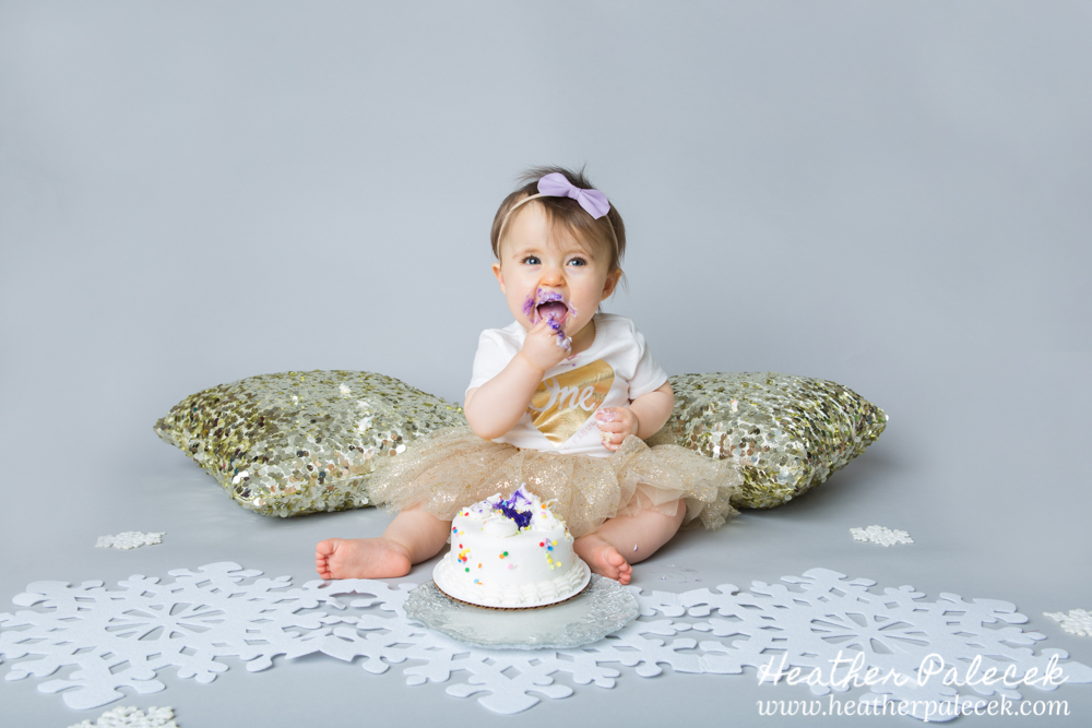 Snowflakes, Gold, and Purple 1st Birthday Cake Smash