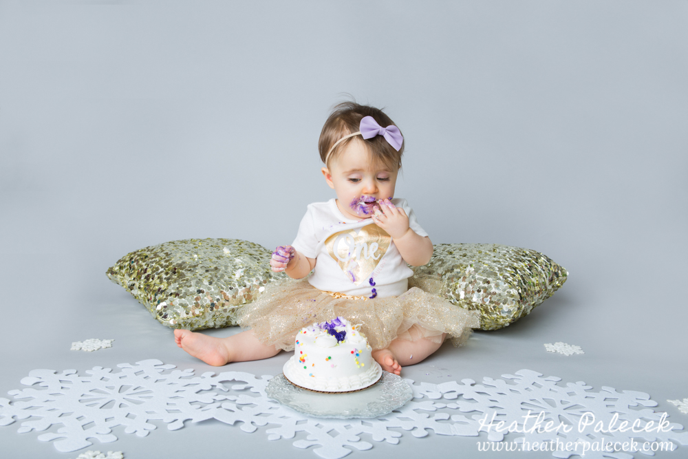 Snowflakes, Gold, and Purple 1st Birthday Cake Smash
