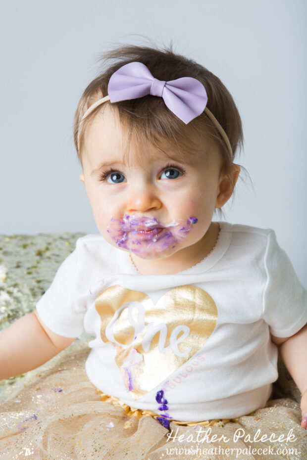 Snowflakes, Gold, and Purple 1st Birthday Cake Smash