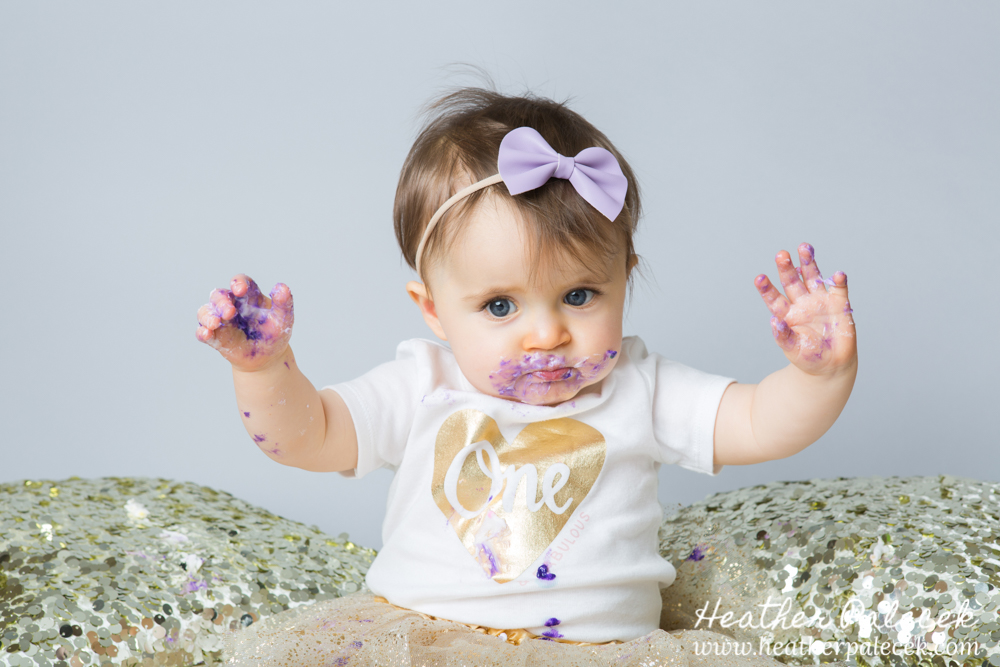 Snowflakes, Gold, and Purple 1st Birthday Cake Smash