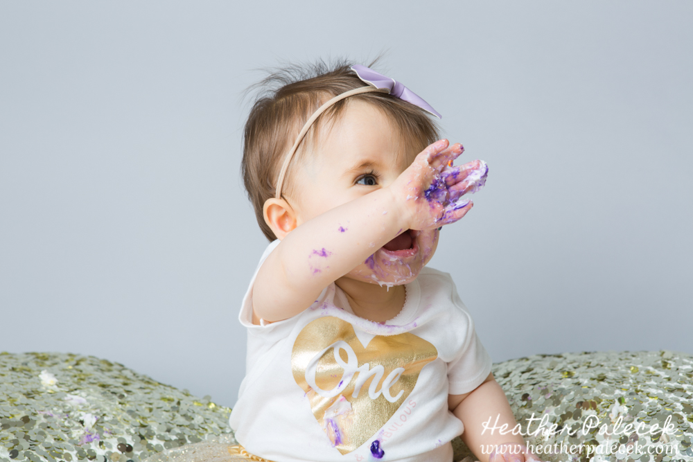 Snowflakes, Gold, and Purple 1st Birthday Cake Smash